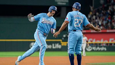 Heim homers, Heaney solid as Rangers beat Orioles 3-2 to avoid sweep