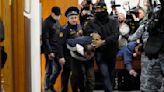 Display of Battered Men Was Russia’s Warning to the Public, Analysts Say