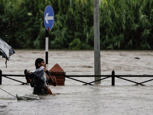 More than 130 people trapped in Tibet after landslides block roads in Nepal