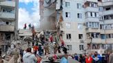 An apartment block collapses in a Russian border city after heavy shelling, injuring over a dozen