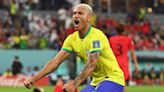 Brazil turns on samba style, dances into World Cup quarterfinals