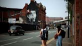 Mural of Joy Division's Ian Curtis returns to Manchester