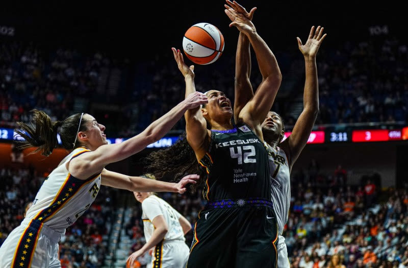 Basketball-Sun cool Fever in Clark’s WNBA debut