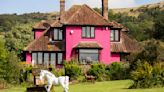 We're furious after our neighbour painted his £450k home bright PINK