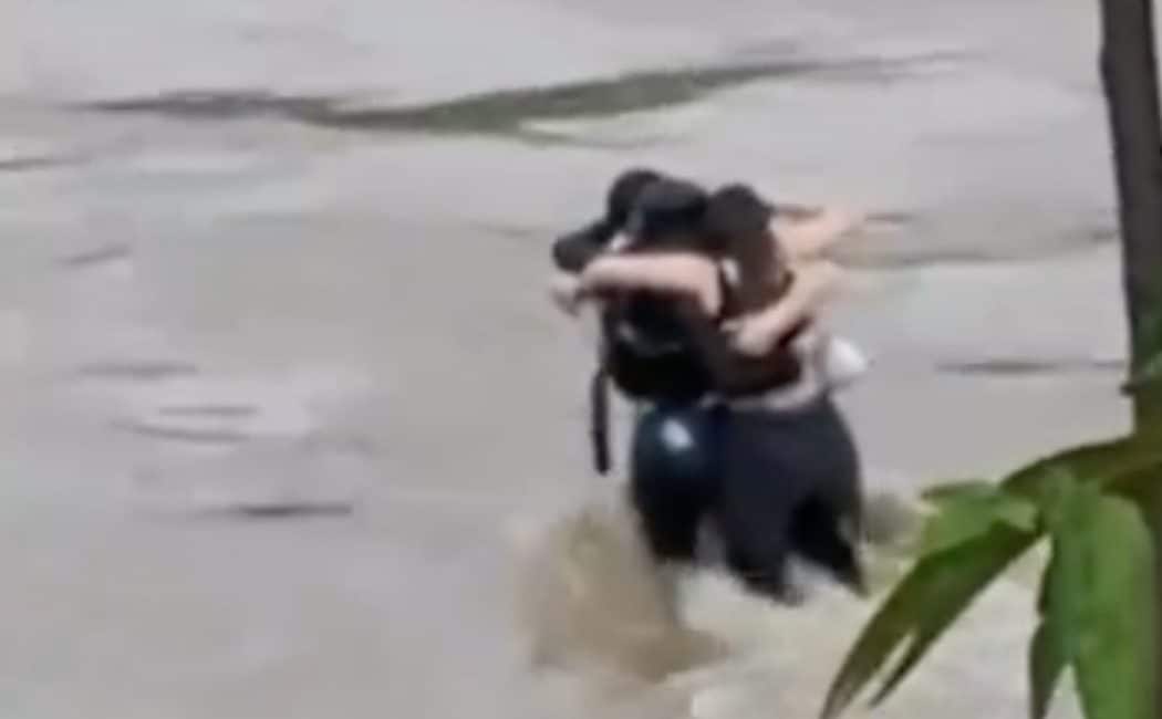 Three friends filmed in final embrace before being swept away by flash floods in Italy