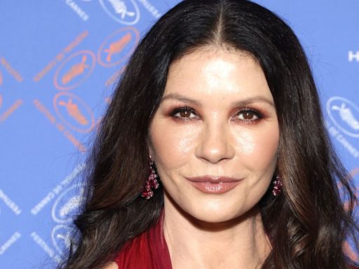 Catherine Zeta-Jones showcases incredibly toned figure in tiny mini dress that sparks reaction from stepson