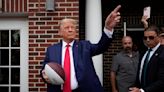 Trump stops at a fraternity house on his way to Iowa-Iowa State football game, outdrawing his rivals
