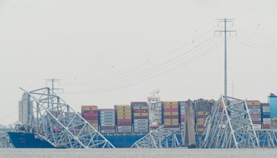 Cranes arriving to start removing wreckage from deadly Baltimore bridge collapse