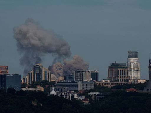 Russian missiles hit a children's hospital in the Ukrainian capital and kill at least 20 elsewhere