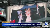 Tuxedoed Travis Kelce joins Taylor Swift onstage at Wembley Stadium show