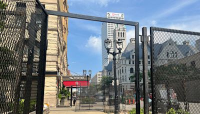 Streets blocked, metal fencing going up around Pfister Hotel ahead of RNC