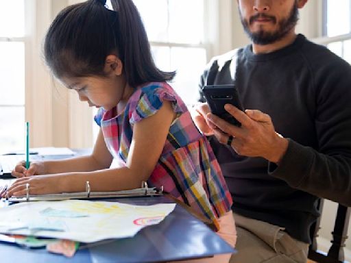 To curb kids’ use of screens, parents may have to cut back on their own