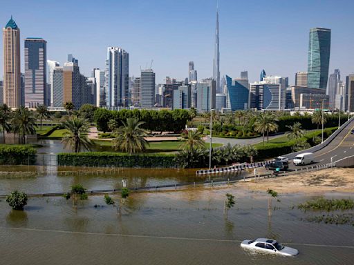 Flights to Dubai disrupted as rain hits the UAE 2 weeks after its heaviest recorded rainfall ever