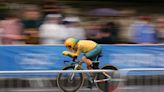 Grace Brown takes gold in rain-soaked women's Olympic time trial ahead of Anna Henderson