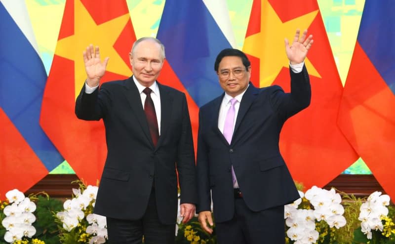 Putin lauds 'trusted friend' Vietnam after signing co-operation deals