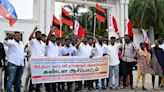 Student outfits of INDIA bloc parties stage demonstration outside Periyar University