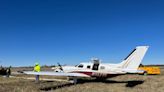 Plane slides off runway and into mud at downtown Kansas City airport