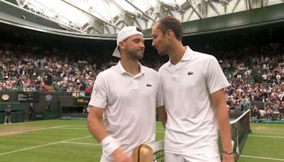 Dimitrov walks to net and ends match after just eight games against Medvedev