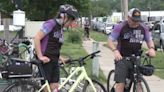 Cyclists bike to various Cedar Rapids businesses to raise awareness of Alzheimer’s