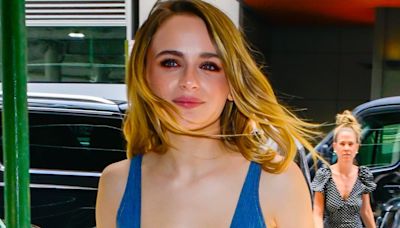 Joey King puts on VERY busty display in racy cut-out denim dress