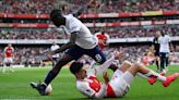 Arsenal enter enemy's den as title race reaches boiling point