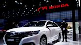 Honda raises annual profit forecast after beating quarterly view