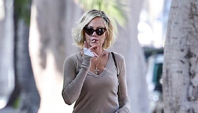 Melanie Griffith puffs on cigarette as she steps out on LA outing