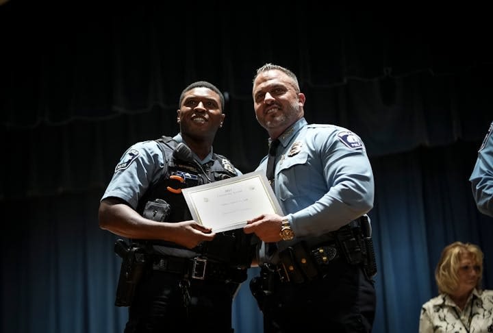 Condolences and tributes pour in for police officer killed in south Minneapolis, flags ordered half-staff