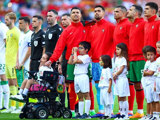 Why does Cristiano Ronaldo stand sideways during Portugal's national anthem at Euro 2024?