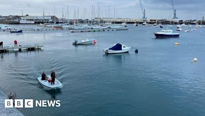 Suspected drug dealer jumps into harbour to evade police