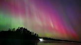 How are the northern lights colors created?