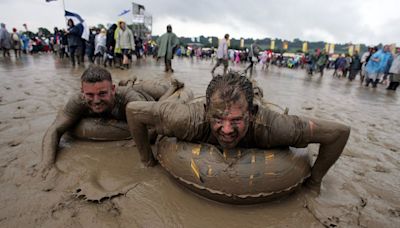 ‘Someone stole my wellies!’: Glastonbury’s five muddiest festivals