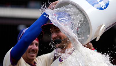 Turner, short-handed Phillies rally past Marlins for 7-6 win