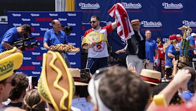 Patrick Bertoletti of Chicago wins his first men’s title at annual Nathan’s hot dog eating contest.