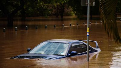 Weather Reporter Rescues Woman in Drowning Car on Live TV