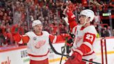 In Swedish or English, a point sounded good to Detroit Red Wings after Senators filibuster
