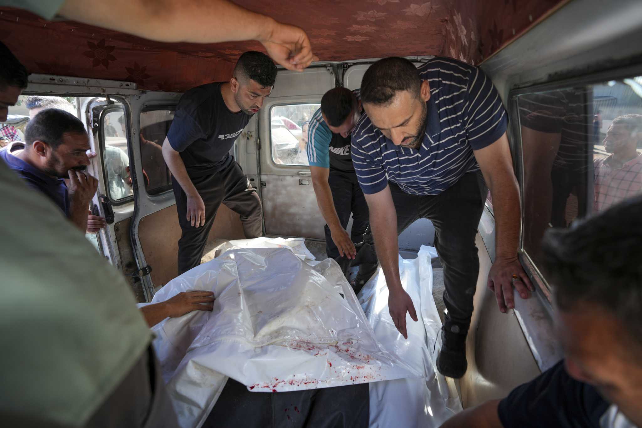 The Latest | Israel bombs another UN-run school in Gaza, a day after strike on school killed 33