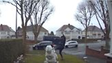 Motorist caught on doorbell cam kicking over snowman made by nine-year-old girl