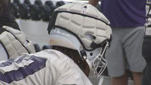 Gwinnett football players getting protective concussion caps for their helmets