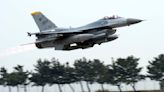 Officials say a US pilot safely ejected before his F-16 crashed into the sea off South Korea