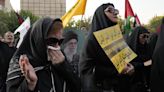 Iran’s supreme leader prays over the coffin of Hamas leader Haniyeh, as fears of a wider war grow