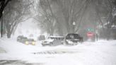 Winter storm Olive – live: Historic snow and ice grips Midwest as 90,000 in California without power