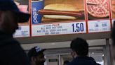 Costco's $1.50 hot dog combo is 'safe,' new CFO says. Here are the hoops the company jumps through to keep prices low on things like chicken and eyeglasses.