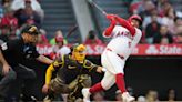 Jo Adell scores the tiebreaking run in the Angels' 2-1 victory over the Padres