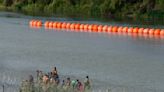 Feds threaten to sue Texas over floating border barriers in Rio Grande