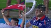 WATCH: Nepali Fan Jumps in the Pool to Celebrate Wicket Taken by Captain Rohit Paudel - News18