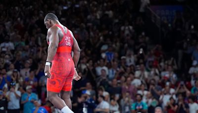 A Cuban wrestler won his fifth straight Olympic gold and then immediately retired