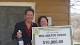 Local woman opens door to giant check from Publishers Clearing House
