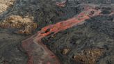 An Iceland volcano starts erupting again, shooting lava into the sky