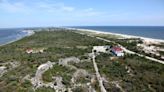 A 15-year-old boy was bitten by a shark while surfing off the coast of New York’s Fire Island